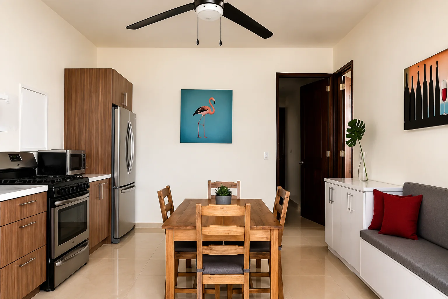 Athens kitchen and dining area with wooden table, stainless appliances and bench seating