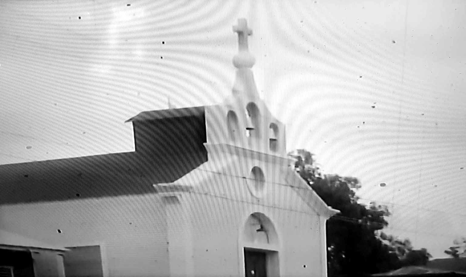 The old Catholic church of Culebra, with its bell gable and cross.