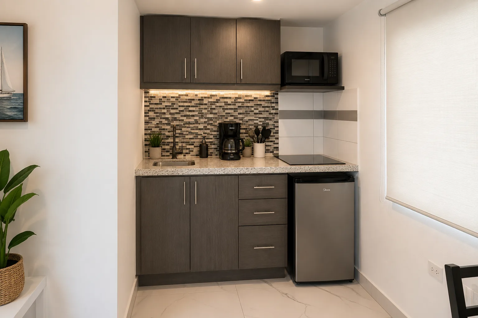 Turkey Apartment equipped kitchen with dark cabinetry