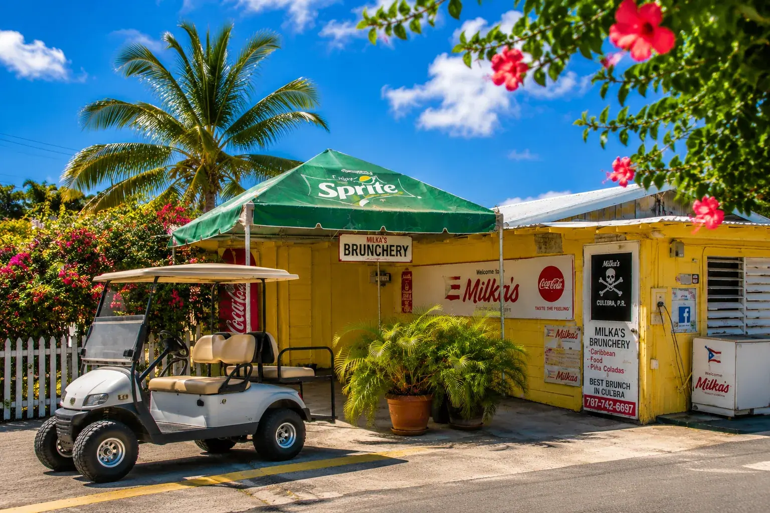 Local Culebra storefront with golf cart parked outside